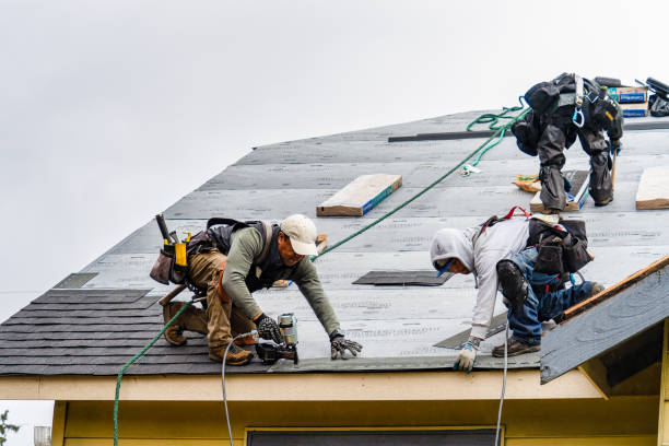 Professional Roof Installation technician working in Reading, MA